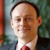Dr Michael  Pollitt
